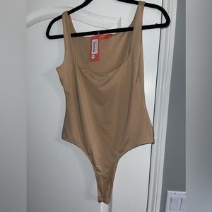Brand new tan Bodysuit
